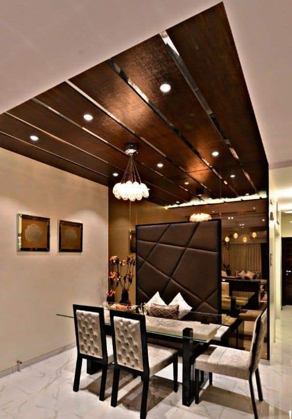 Dining table with upholstered chairs in a modern dining room